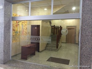 PUERTA DE CRISTAL AUTOMATICA CORREDERA COMUNIDAD DE PROPIETARIOS EZCURDIA 27/29 Y PREMIO REAL 11, GIJON, ASTURIAS
