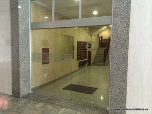 PUERTA DE CRISTAL AUTOMATICA CORREDERA COMUNIDAD DE PROPIETARIOS EZCURDIA 27/29 Y PREMIO REAL 11, GIJON, ASTURIAS