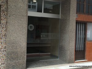 PUERTA DE CRISTAL AUTOMATICA CORREDERA COMUNIDAD DE PROPIETARIOS EZCURDIA 27/29 Y PREMIO REAL 11, GIJON, ASTURIAS