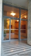 PUERTA AUTOMATICA DE CRISTAL COMUNIDAD DE PROPIETARIOS DANZA PRIMA 18 POLA DE SIERO