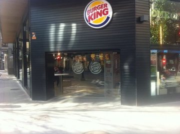 Puerta de cristal automática. Burguer King Gijón